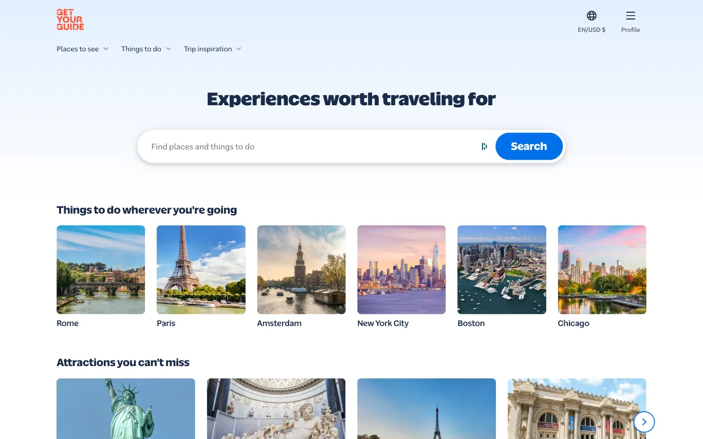 GetYourGuide homepage hero with the headline "Experiences worth traveling for," a large search bar and destination cards for Rome, Paris and other cities