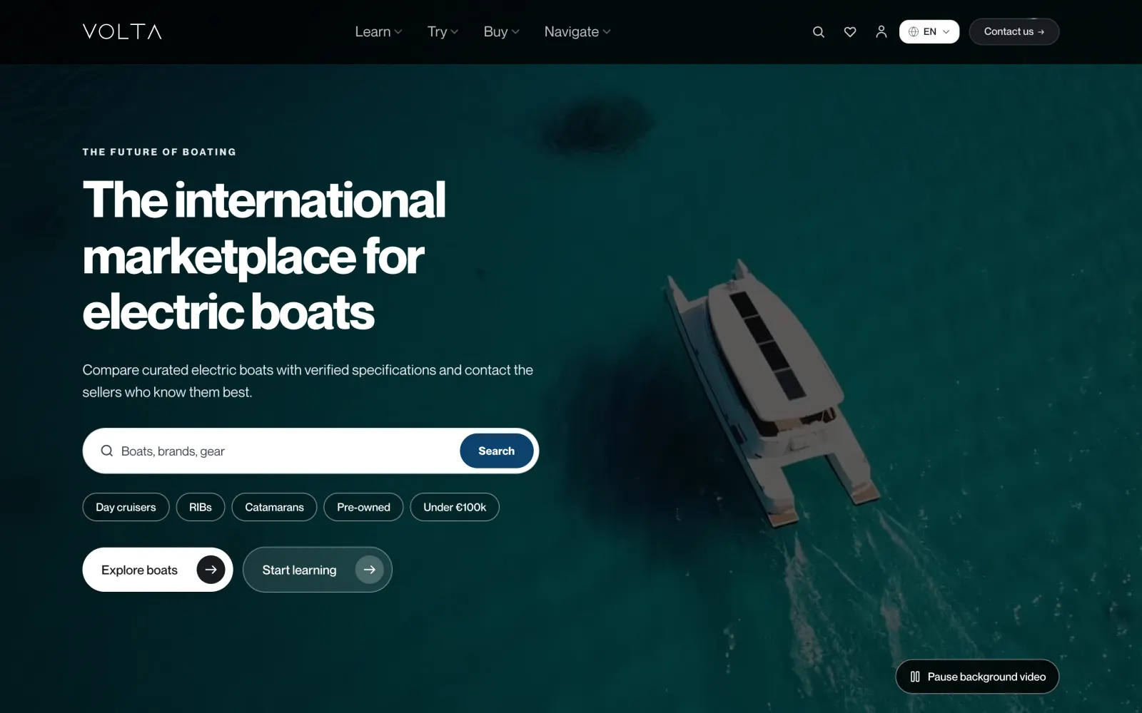 Volta Yachts homepage hero on a dark background with the headline "The international marketplace for electric boats" and a boat search box